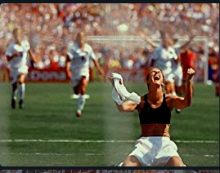 Brandi Chastain celebrating. 